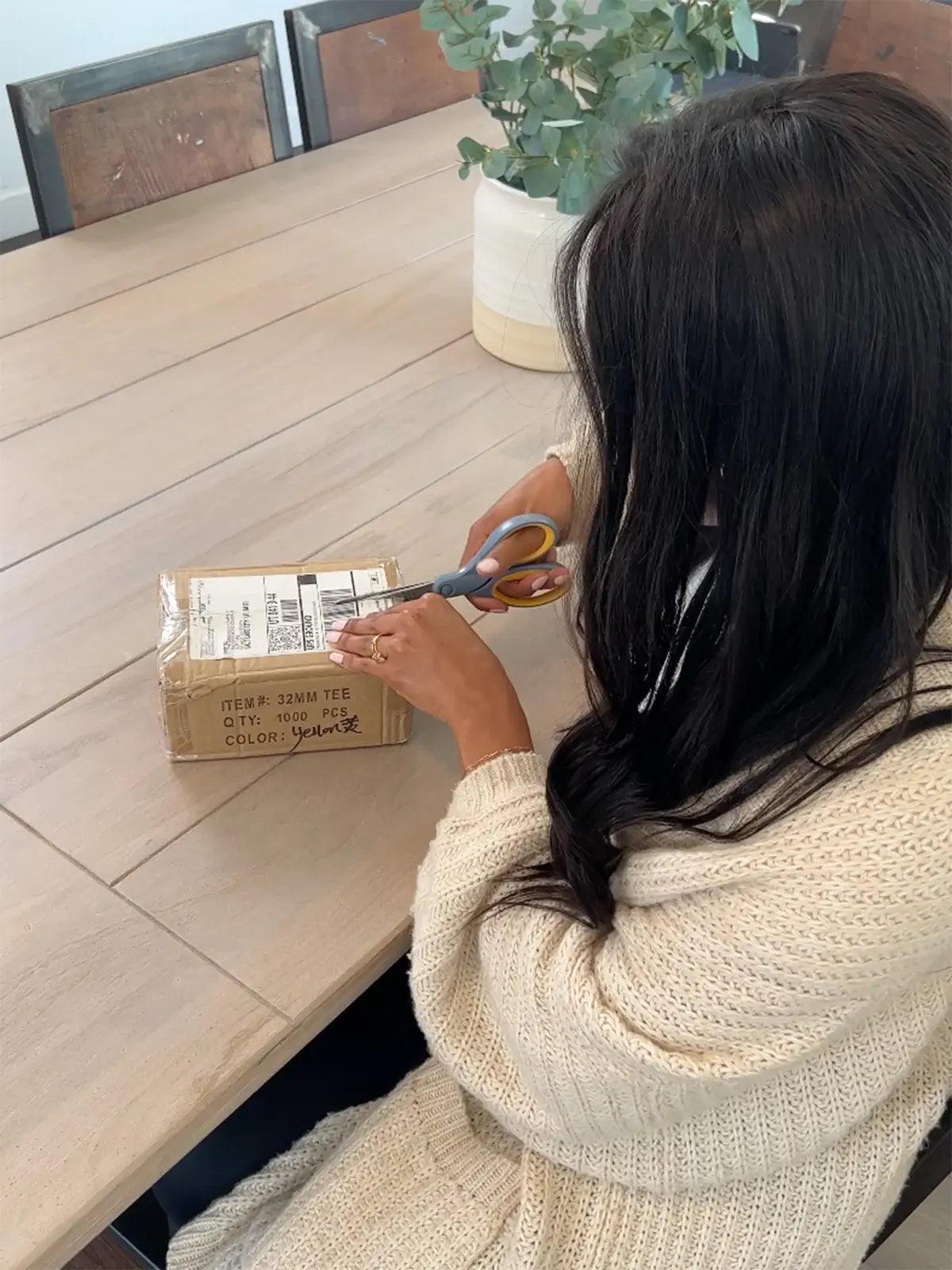 lady opening car key parcel